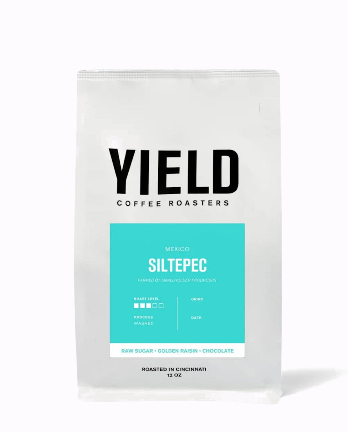 Yield Coffee Roasters coffee package with teal label on a white background